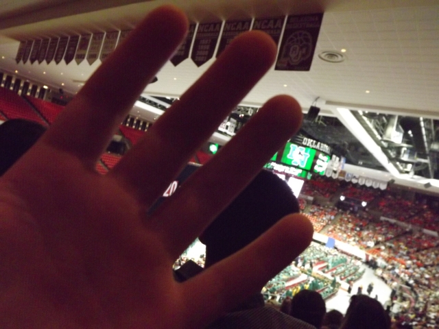 Never mind that we were at the Norman North High School graduation - Zack found his hand way more interesting :)